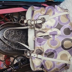 #18. Coach purple & gold bag